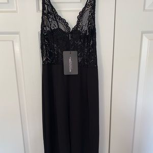 Brand new/never been worn black jump suit